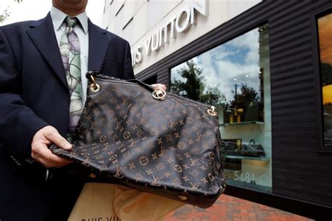 fake louie|Louis Vuitton Allegedly Caught Selling Fake Bags In Their Own .